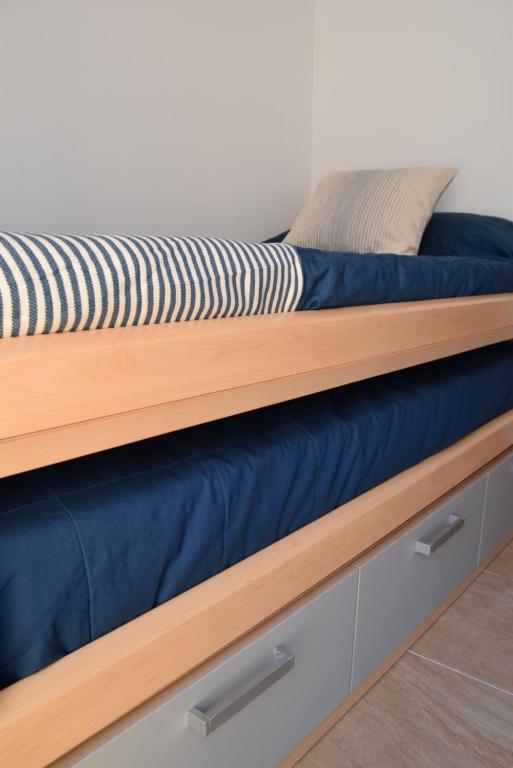 Postel nebo postele na pokoji v ubytování Apartament Lo Passador