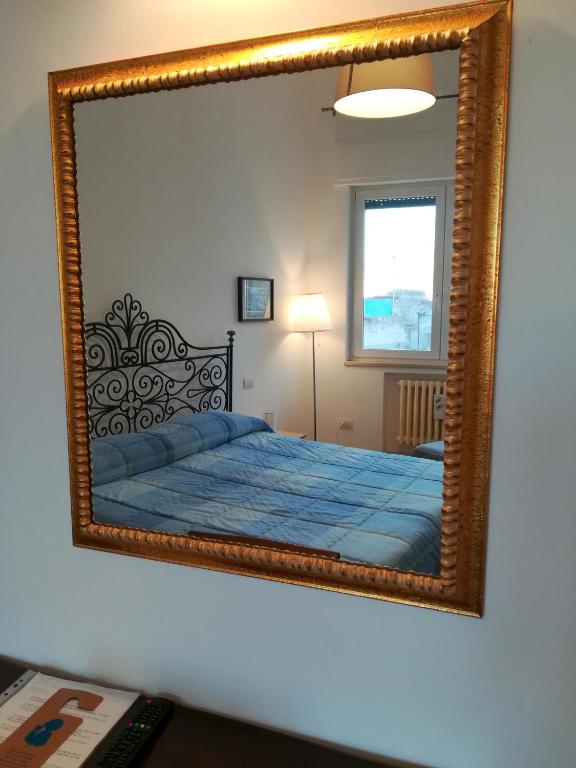 A bed or beds in a room at Persio31