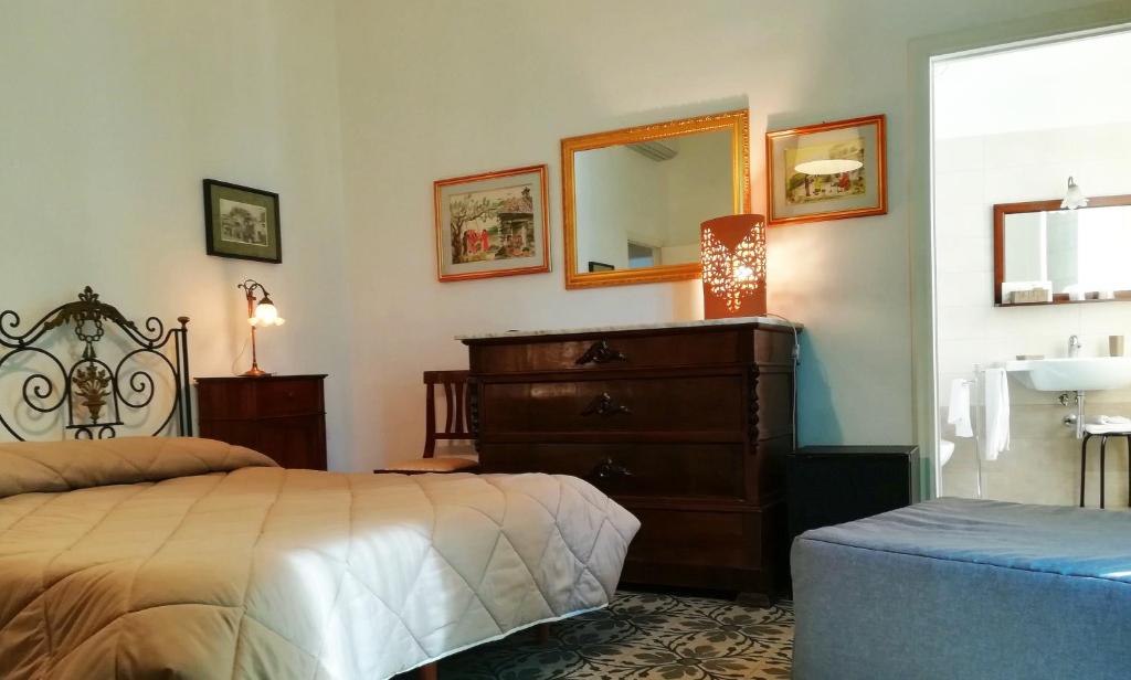 A bed or beds in a room at Persio31