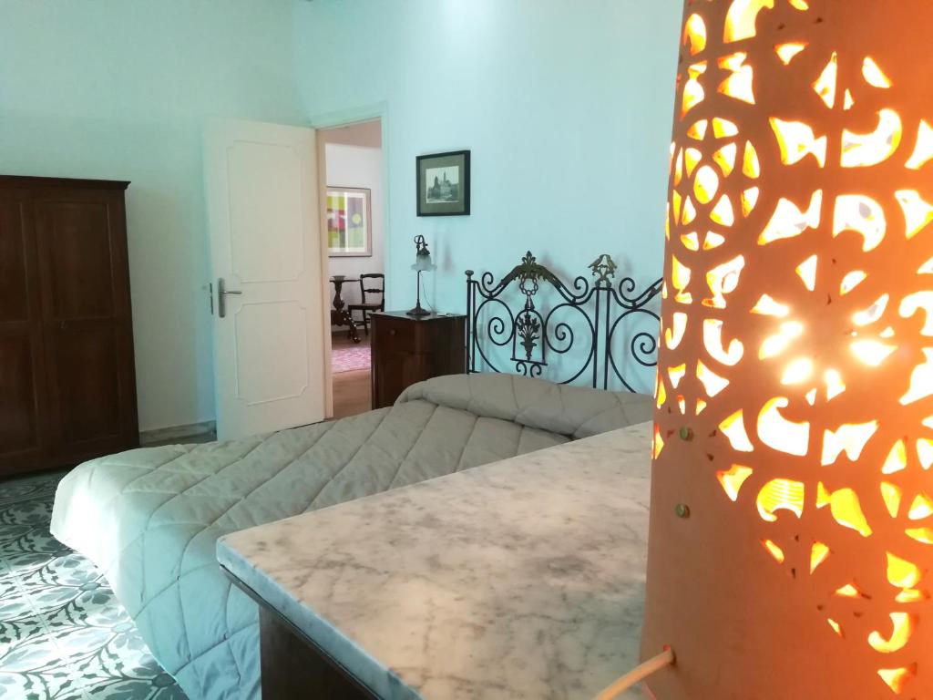 A bed or beds in a room at Persio31