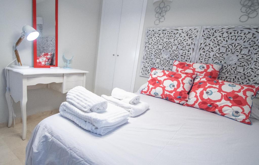 Posteľ alebo postele v izbe v ubytovaní Apartamento Sueño de la Caleta