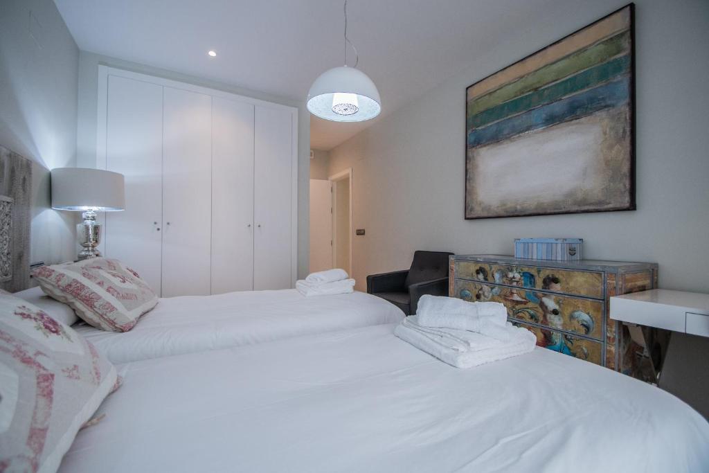 Posteľ alebo postele v izbe v ubytovaní Apartamento Sueño de la Caleta