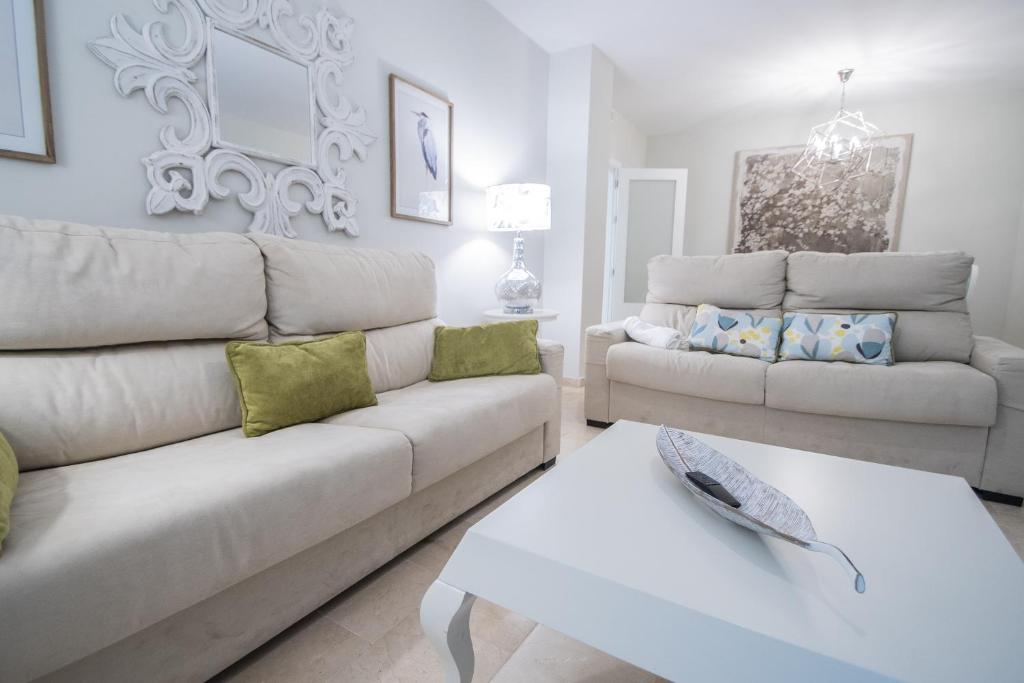 Posedenie v ubytovaní Apartamento Sueño de la Caleta