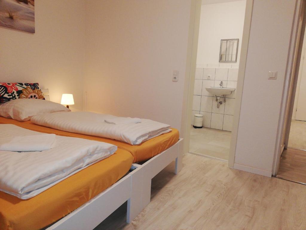 Postel nebo postele na pokoji v ubytování The Hostel