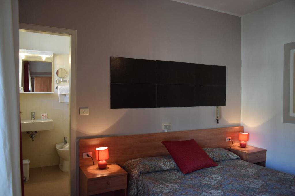 TV a/nebo společenská místnost v ubytování Albergo Al Pescatore