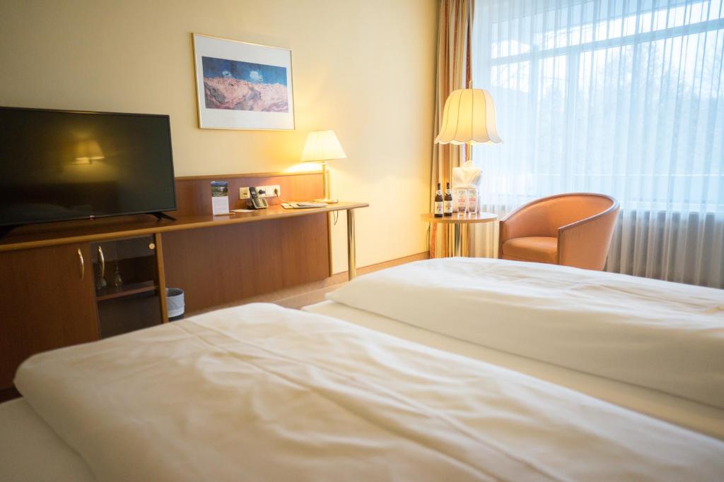 Postel nebo postele na pokoji v ubytování Hotel Alexandersbad