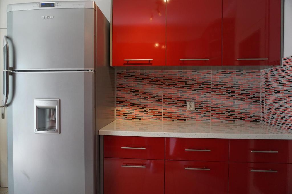 Kuchyňa alebo kuchynka v ubytovaní Deluxe Apartman Pervan