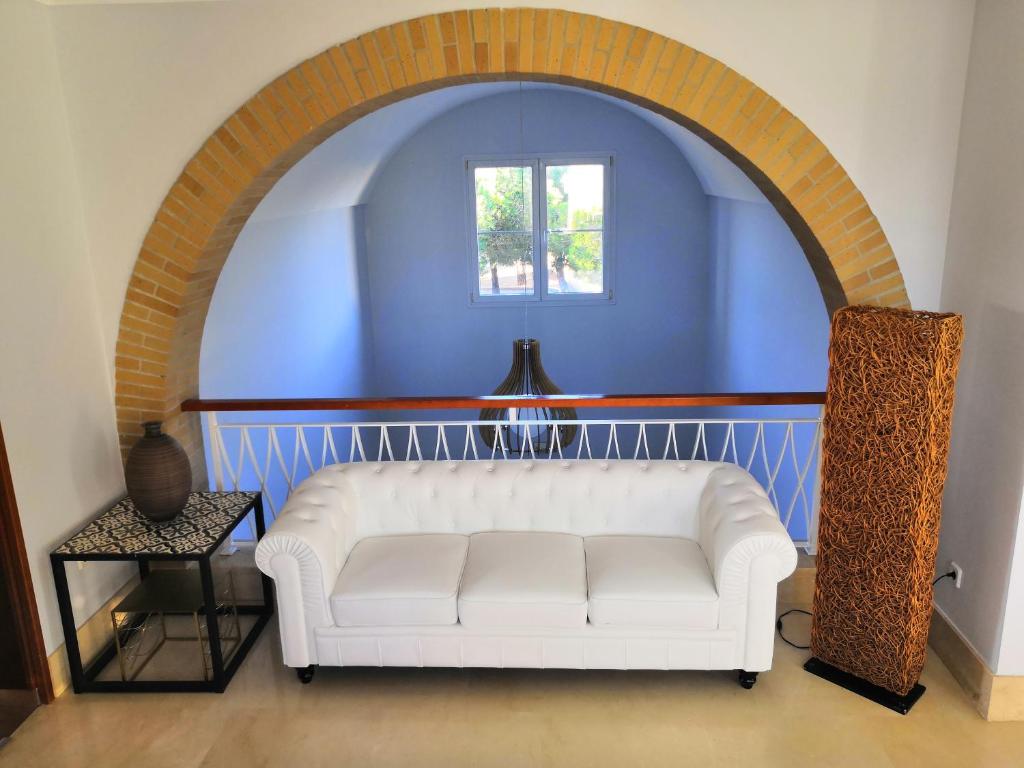 Кровать или кровати в номере Hotel Marisma Sancti Petri