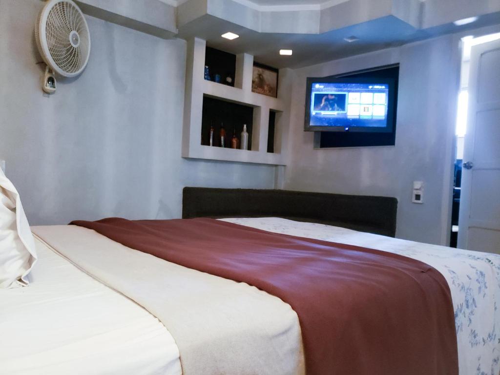 Postel nebo postele na pokoji v ubytování Silmar Hotel/Motel