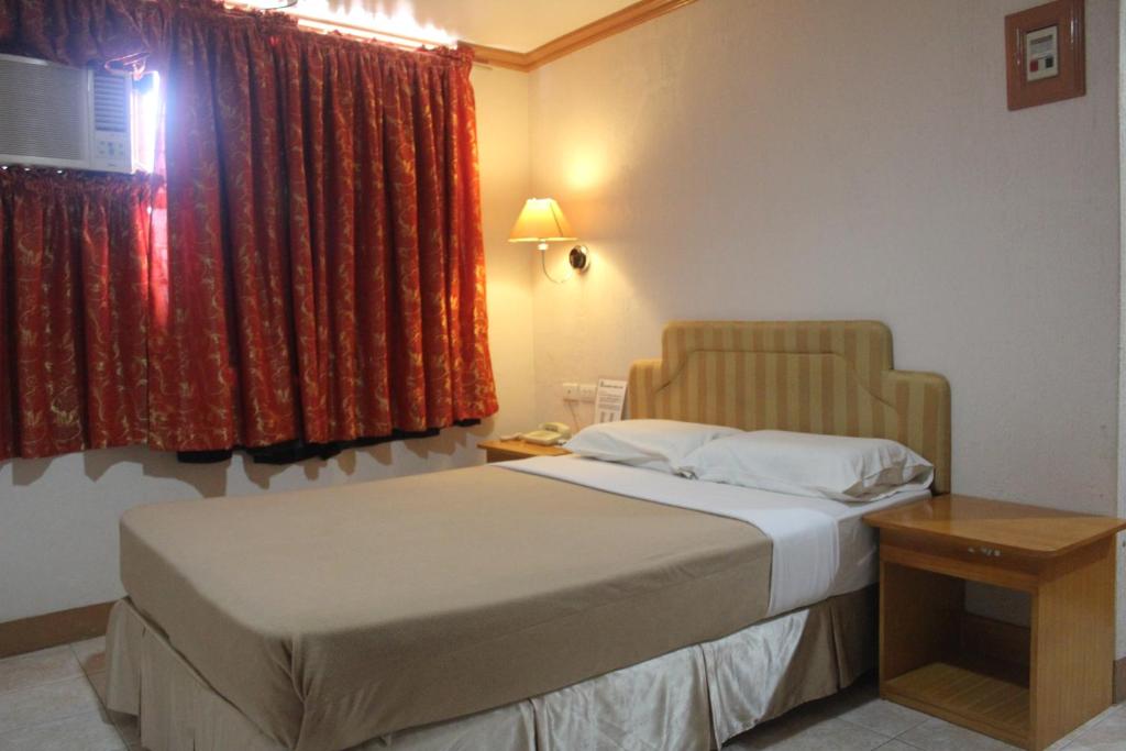 Postel nebo postele na pokoji v ubytování Elegant Circle Inn