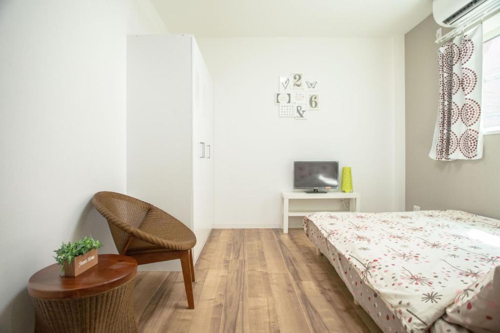TV a/nebo společenská místnost v ubytování Osaka Tsuruhashitei Hotel Asahi group 大阪鶴橋亭ホテル