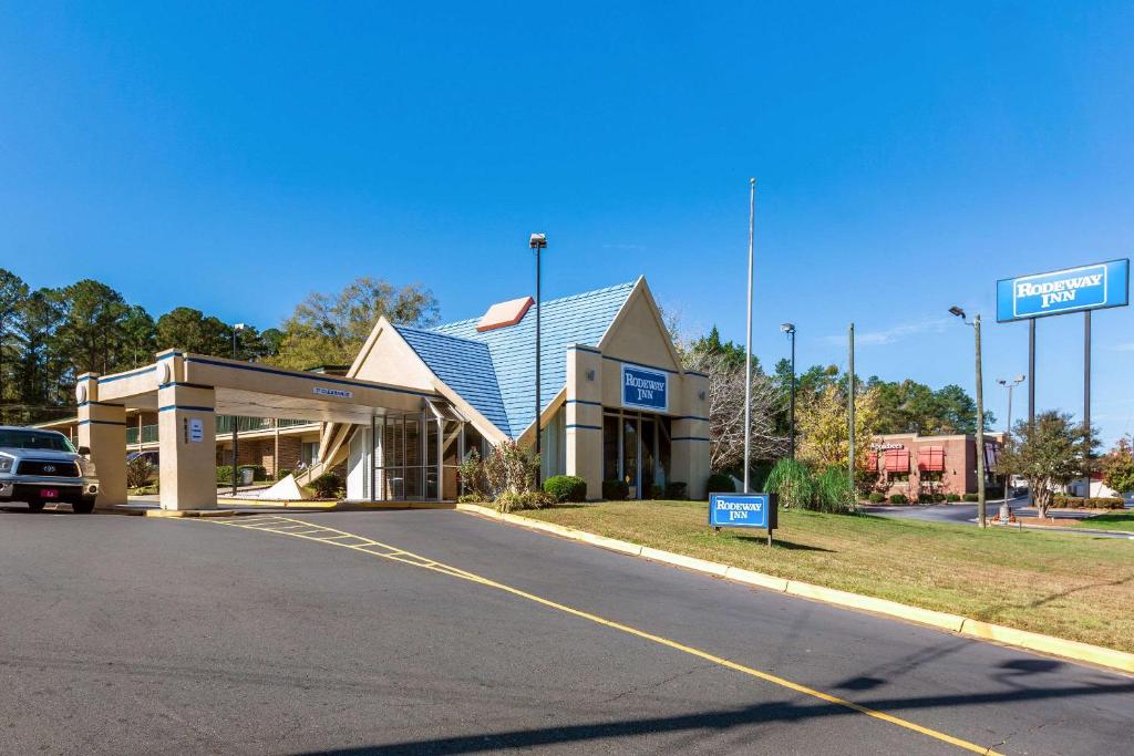 a gas station on the side of the road at Super 8 by Wyndham Macon GA in Macon