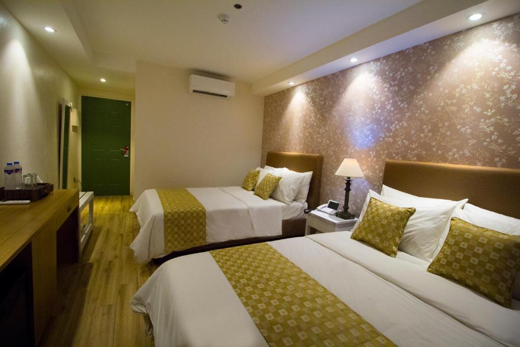 Postel nebo postele na pokoji v ubytování Sola Hotel