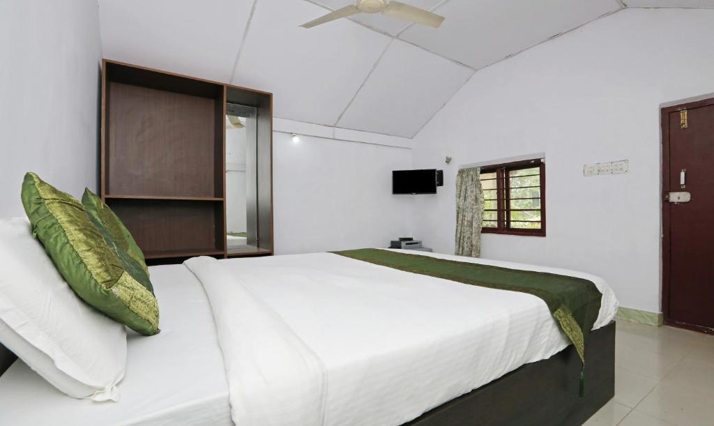 Postel nebo postele na pokoji v ubytování Itsy Hotels Jammabane Cottage