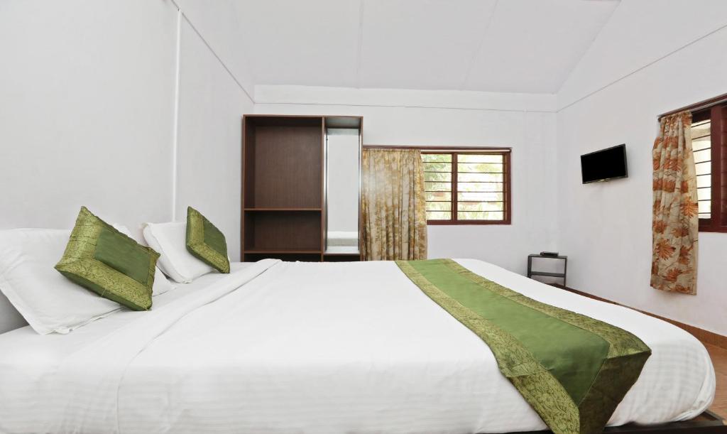 Postel nebo postele na pokoji v ubytování Itsy Hotels Jammabane Cottage