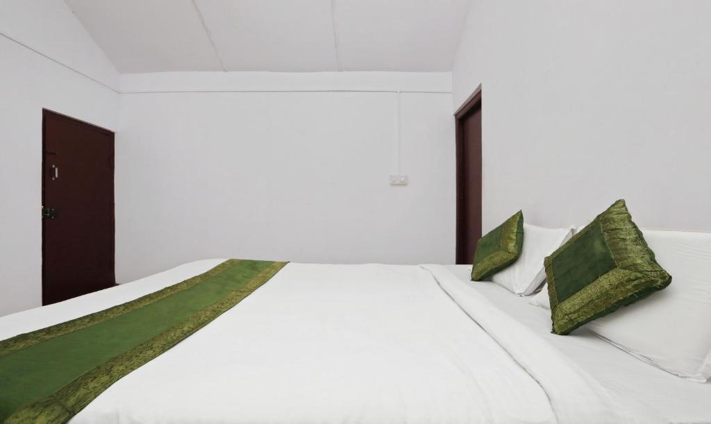 Postel nebo postele na pokoji v ubytování Itsy Hotels Jammabane Cottage