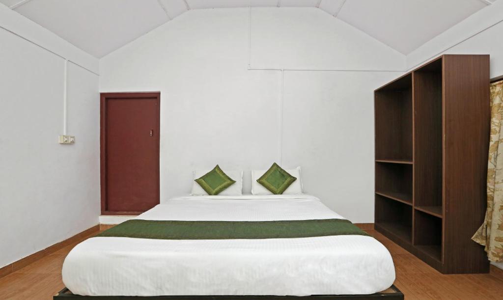 Postel nebo postele na pokoji v ubytování Itsy Hotels Jammabane Cottage