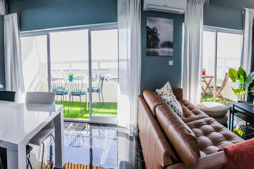 A seating area at Panoramic Seaview Puerto Marina