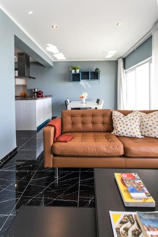 A kitchen or kitchenette at Panoramic Seaview Puerto Marina