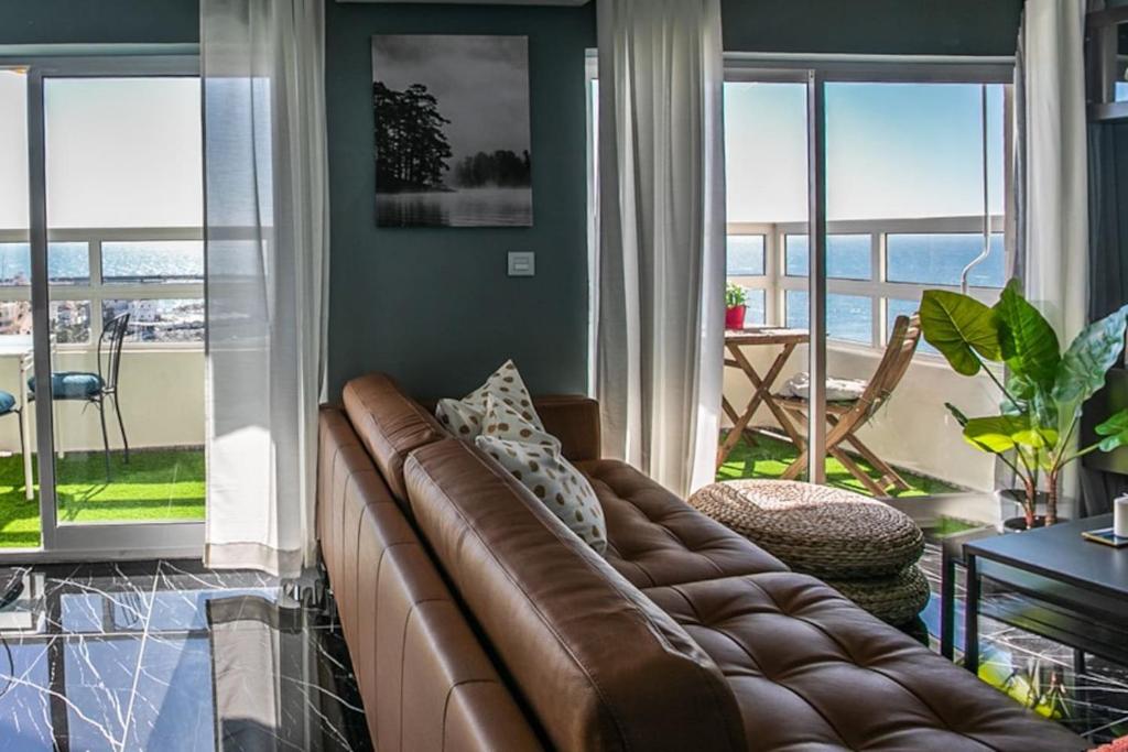 A seating area at Panoramic Seaview Puerto Marina