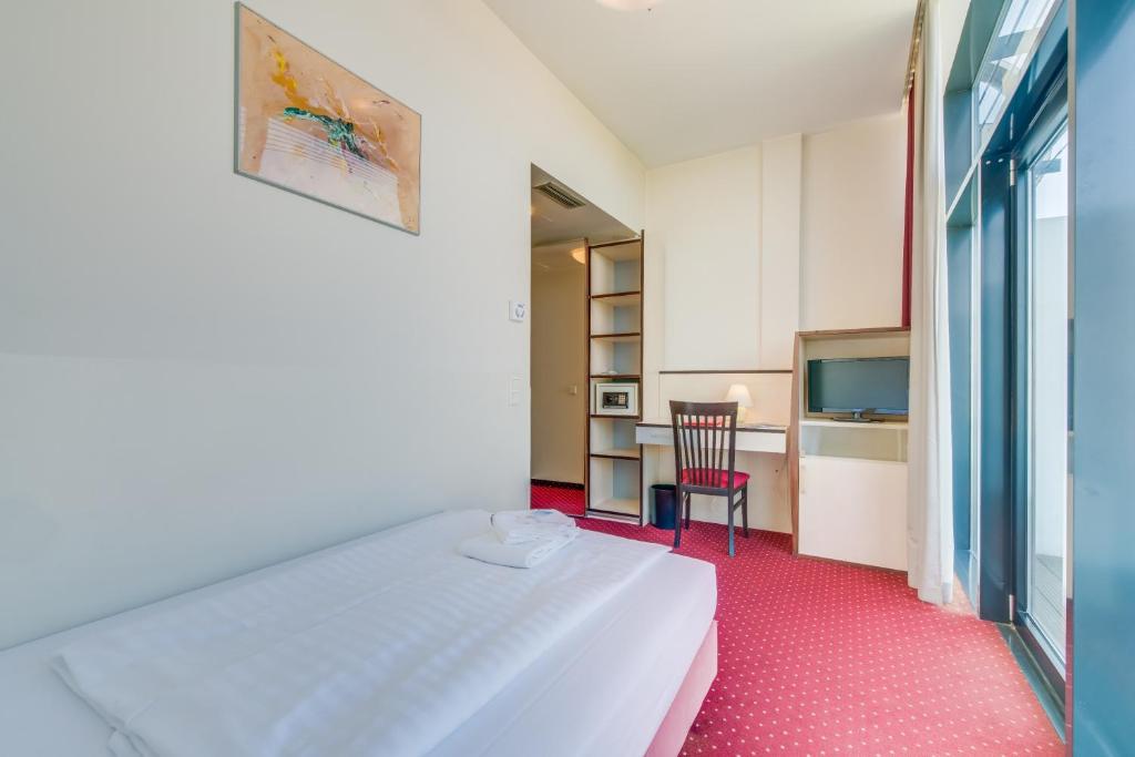 Kuchyň nebo kuchyňský kout v ubytování Come Inn Berlin Kurfürstendamm