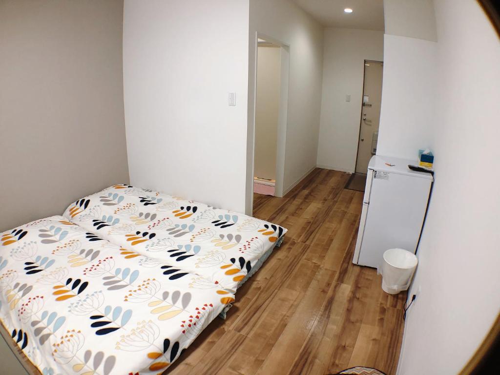 Postel nebo postele na pokoji v ubytování Osaka Tsuruhashitei Hotel Asahi group 大阪鶴橋亭ホテル