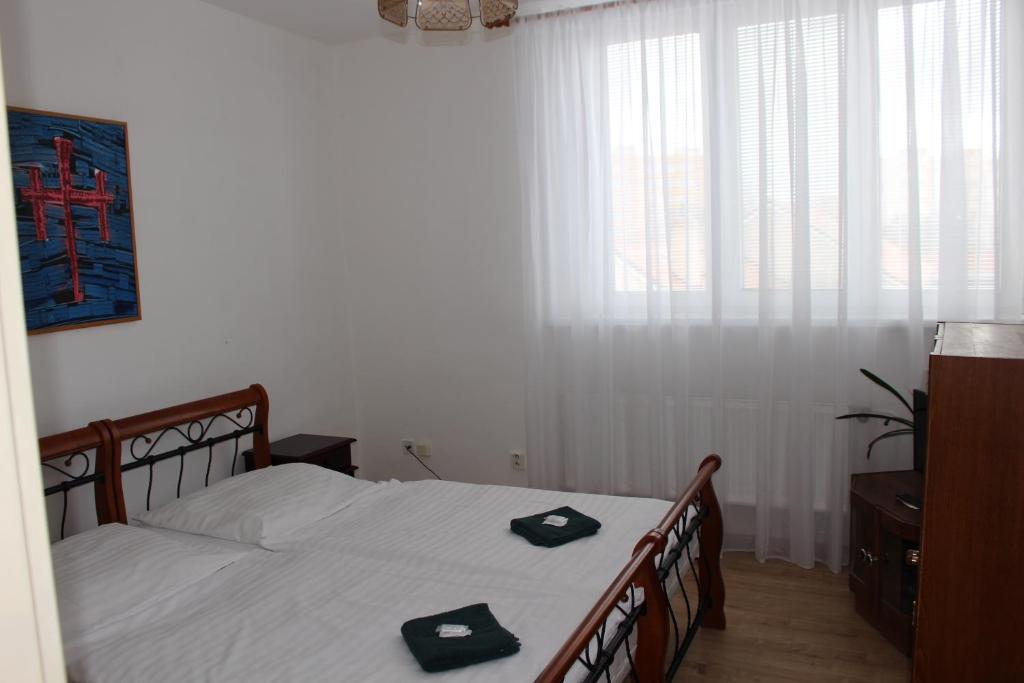 Postel nebo postele na pokoji v ubytování Hotel Černý kůň