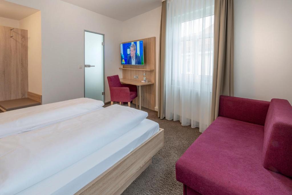 TV a/nebo společenská místnost v ubytování Hotel Gasthof Zum Rössle