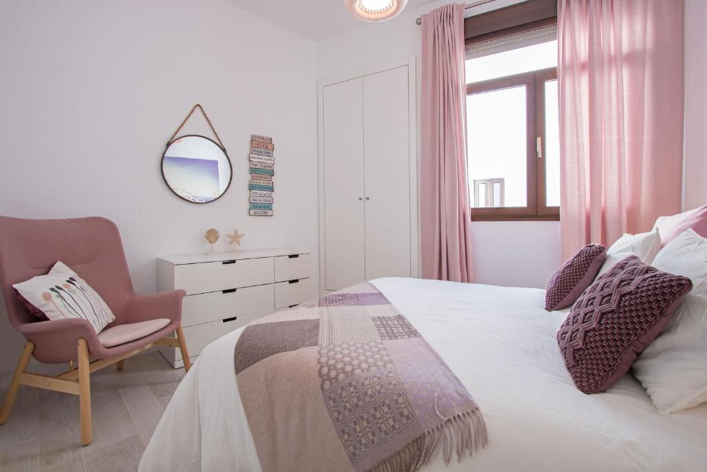 Postel nebo postele na pokoji v ubytování Ohliving San Gregorio