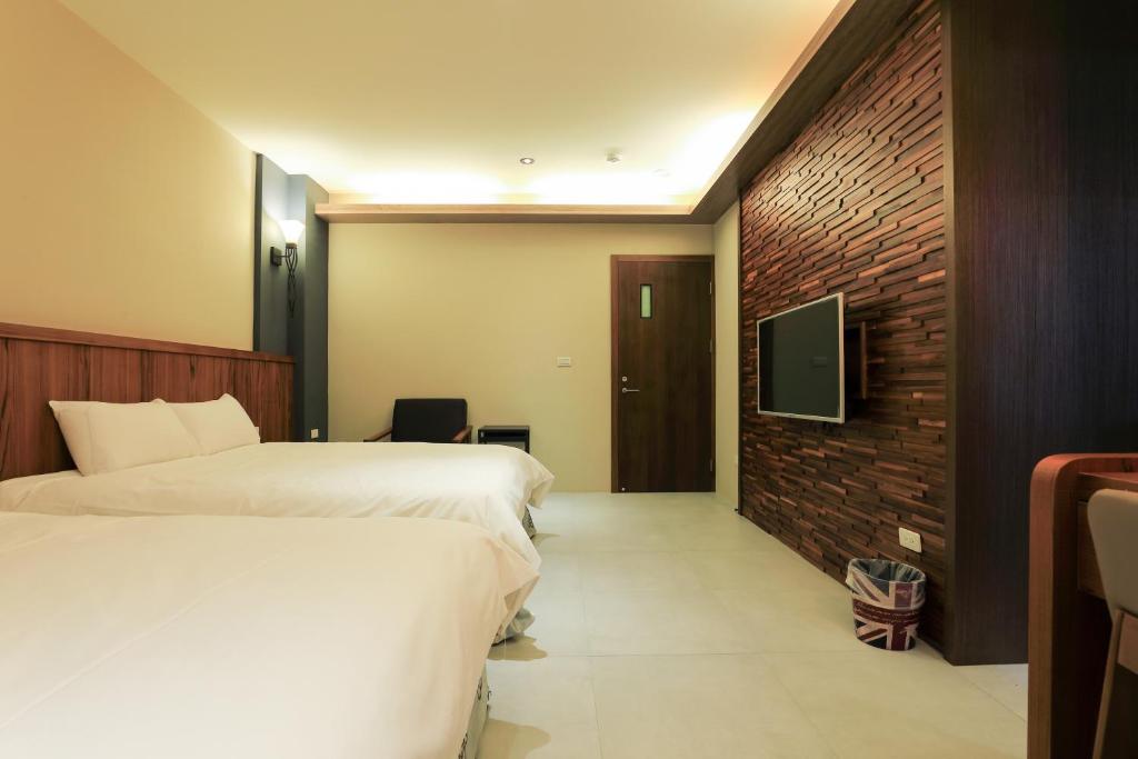 Postel nebo postele na pokoji v ubytování Sharp B&B