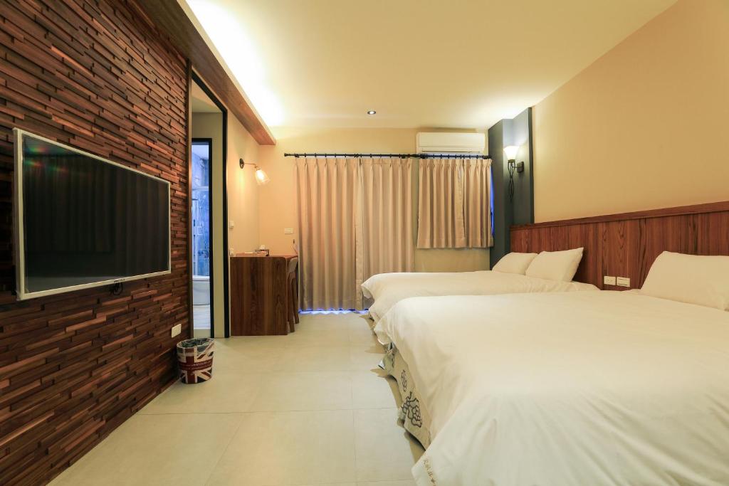 Postel nebo postele na pokoji v ubytování Sharp B&B