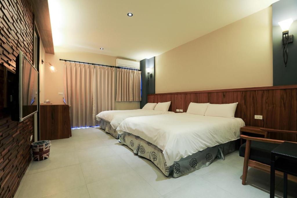 Postel nebo postele na pokoji v ubytování Sharp B&B