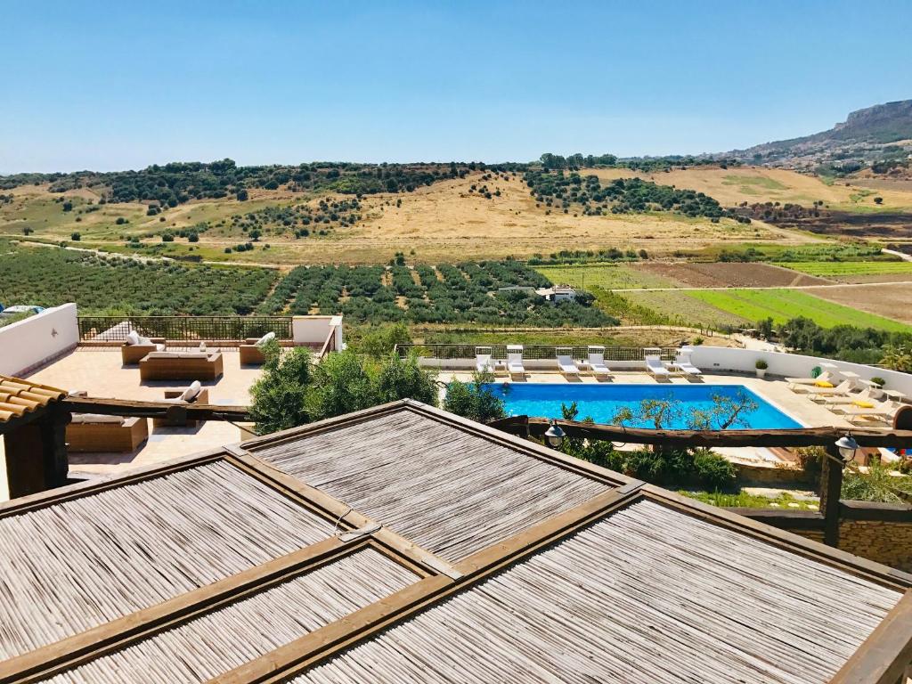 a view from the roof of a house with a pool at Tenuta Carabollace in Sciacca