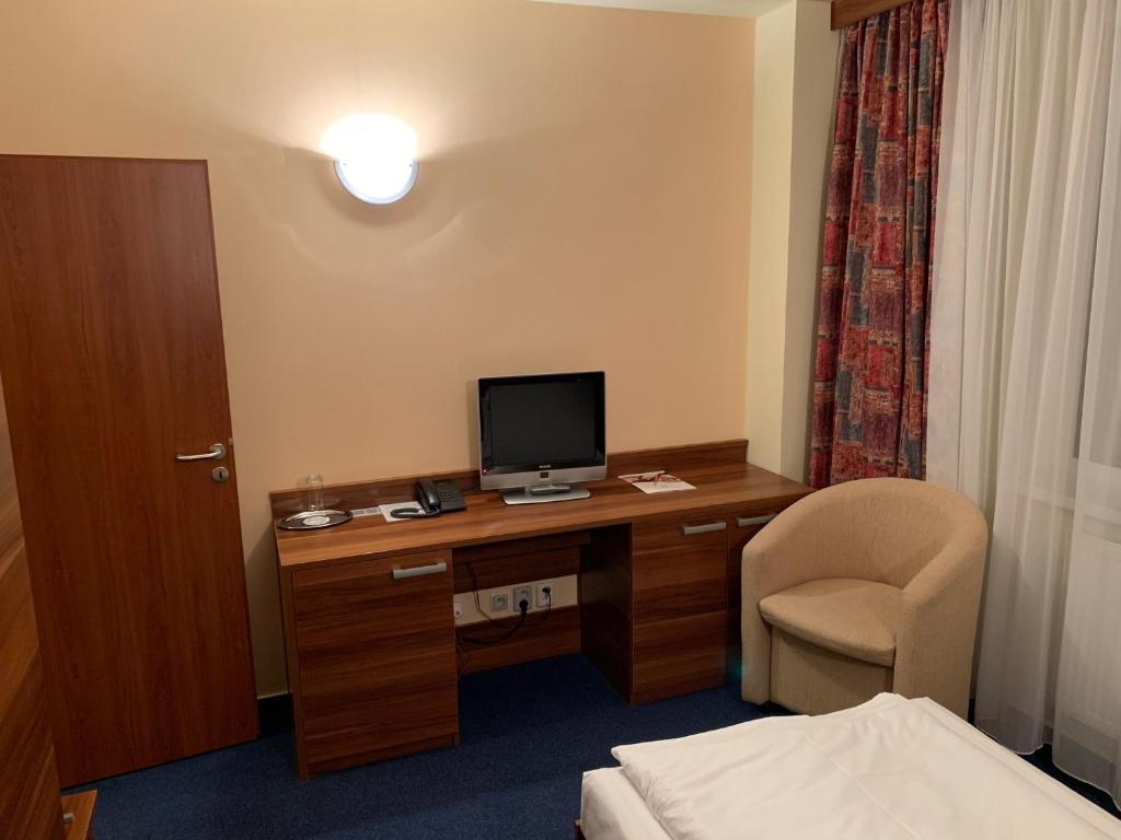 Telewizja i/lub zestaw kina domowego w obiekcie Wellness & Spa Apartments Lipno - Frymburk