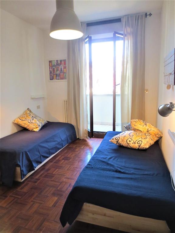 Postel nebo postele na pokoji v ubytování Quarto di Luna