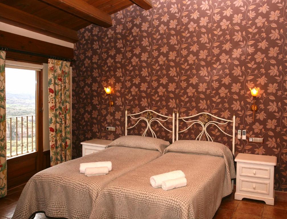 Postel nebo postele na pokoji v ubytování Casa Avellanas