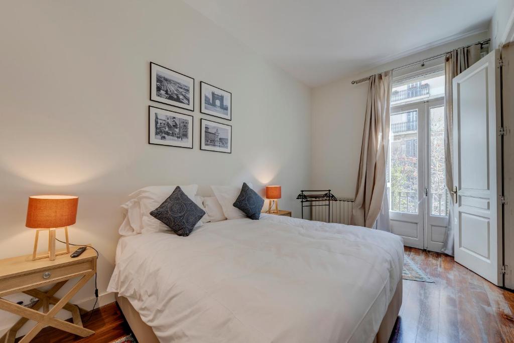 Postel nebo postele na pokoji v ubytování BCN Apartments 41