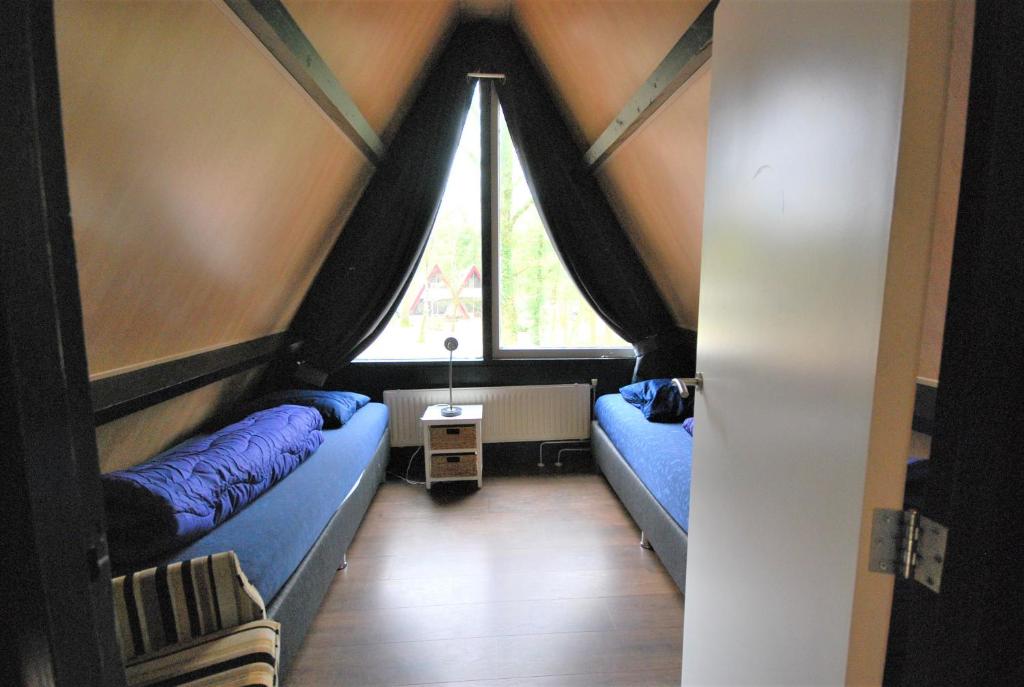 Posezení v ubytování Bungalows Bospark te Stramproy