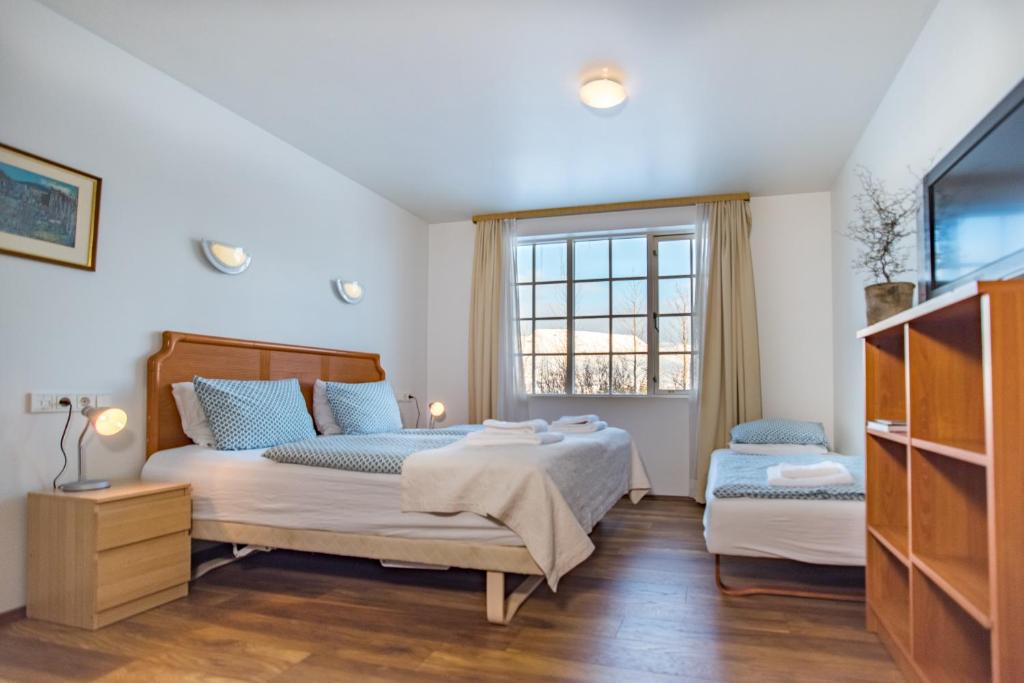 Postel nebo postele na pokoji v ubytování Hotel Laxnes