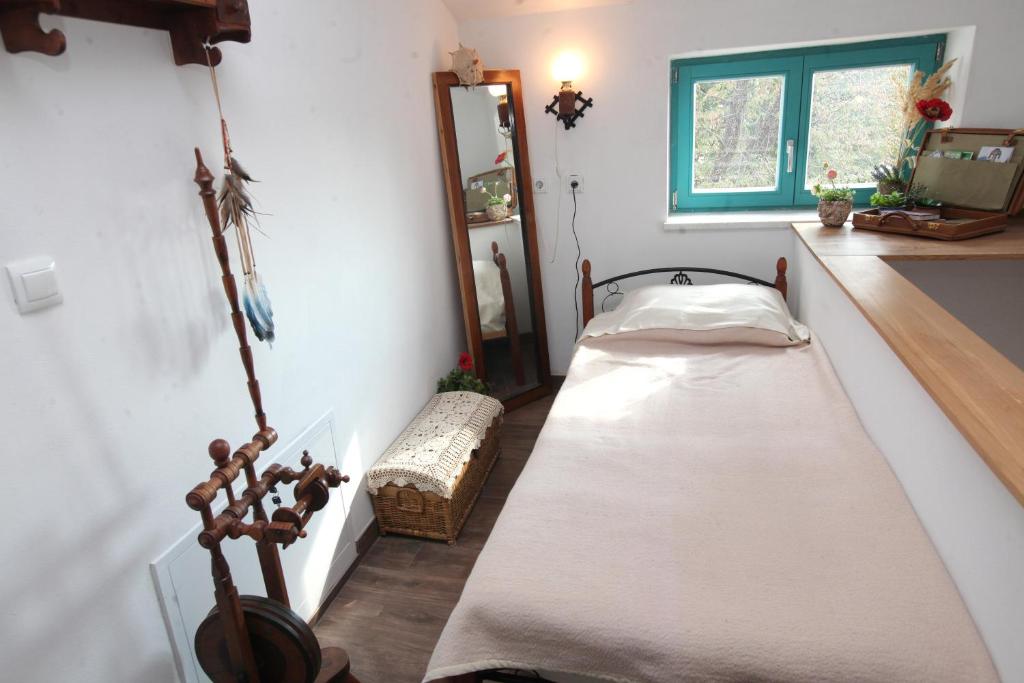 Postel nebo postele na pokoji v ubytování Vila Salamander