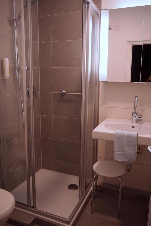 Koupelna v ubytování Hotel Alexa