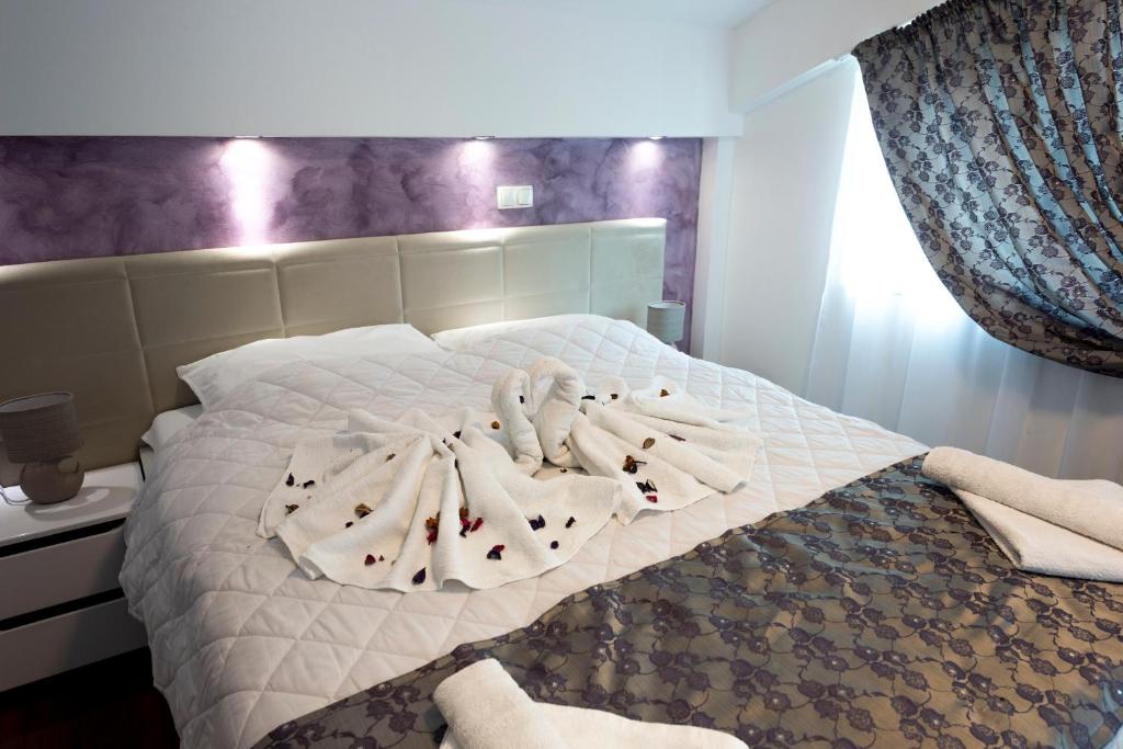 Postel nebo postele na pokoji v ubytování Hotel Oasis