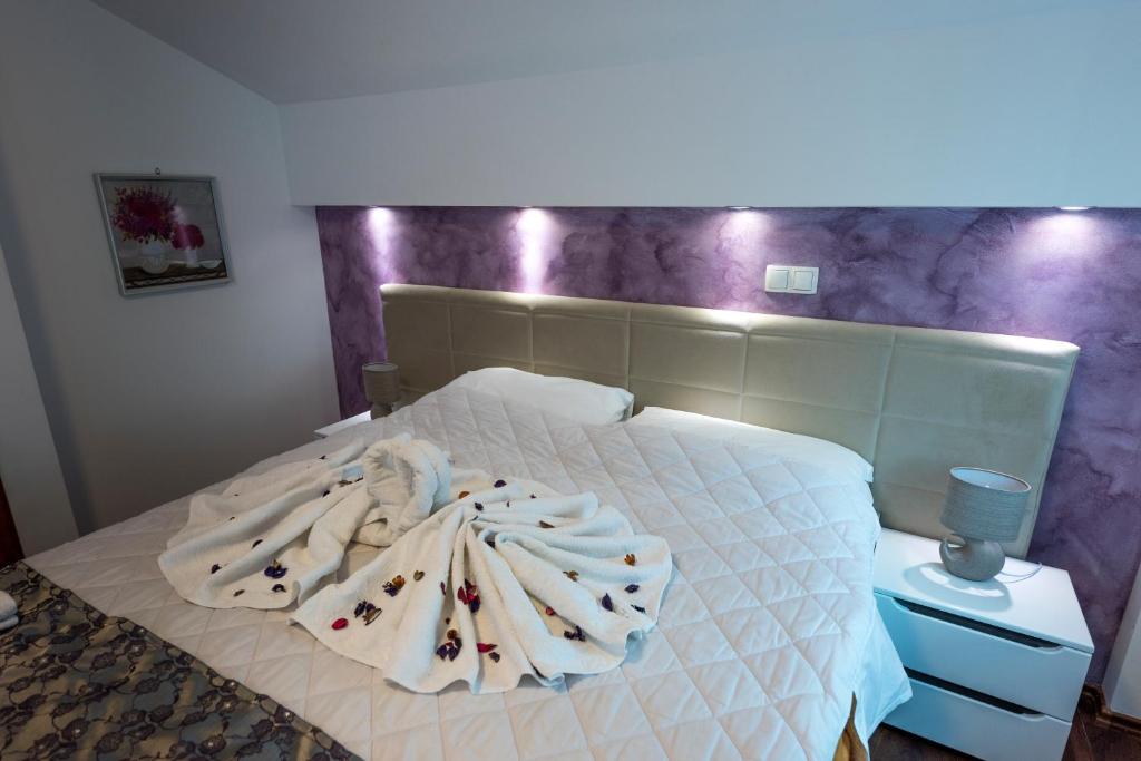 Postel nebo postele na pokoji v ubytování Hotel Oasis