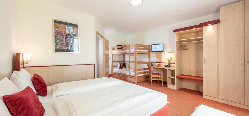 Postel nebo postele na pokoji v ubytování Hotel Am Wiesenweg l 24h check-in