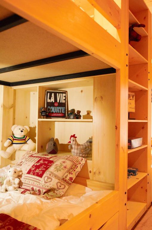 Postel nebo postele na pokoji v ubytování Selenia Lodge- Résidences et Chalets dans les Laurentides