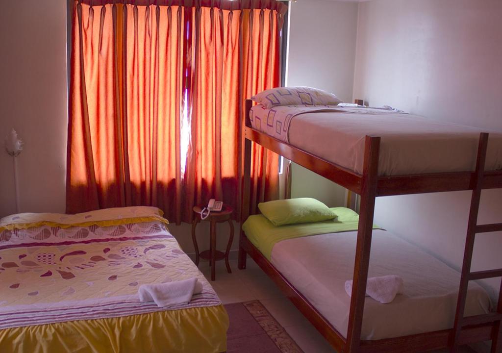 Postel nebo postele na pokoji v ubytování Hostal Oro Orense