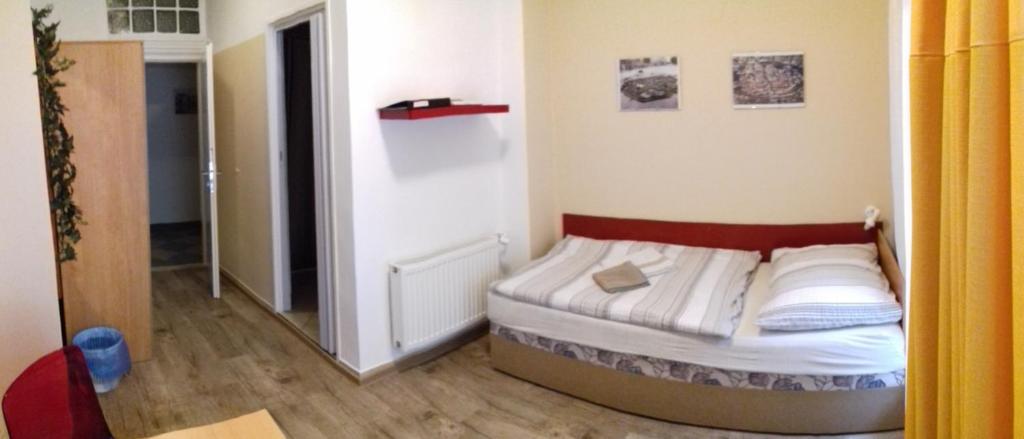 Postel nebo postele na pokoji v ubytování Apartmány Brno