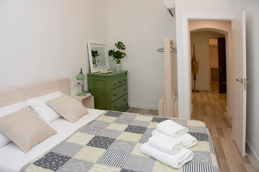 Postel nebo postele na pokoji v ubytování Can Pauet Apartaments