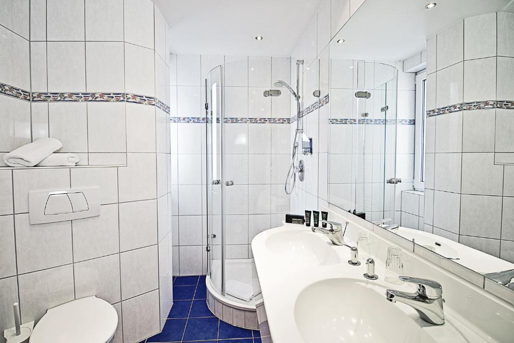 Koupelna v ubytování Hotel Goldene Rose
