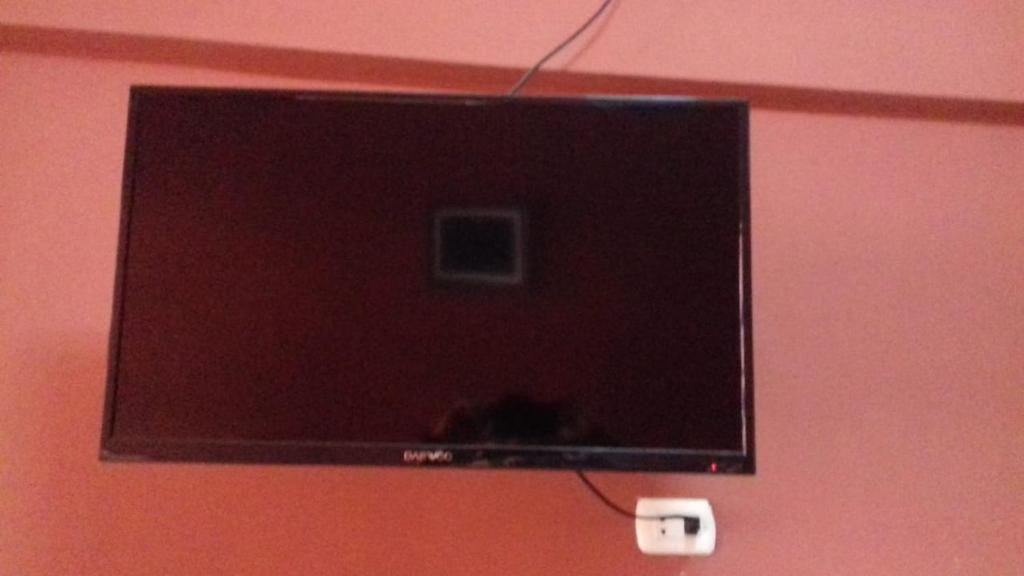 TV a/nebo společenská místnost v ubytování Hostal Virrey & Tours